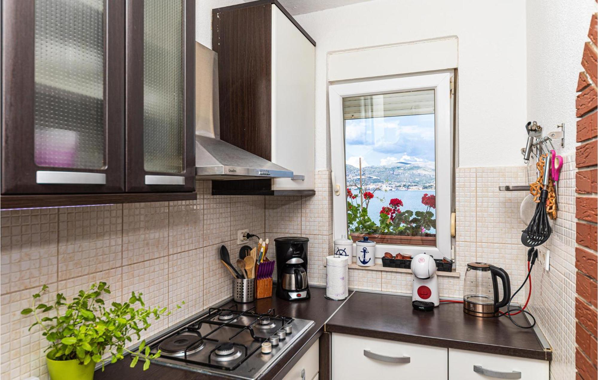 2 Bedroom Beautiful Apartment In Okrug Gornji Trogir Bagian luar foto